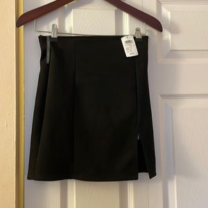 Black mini skirt with side front slit